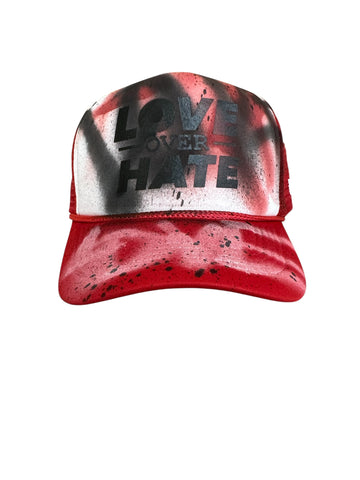 Love over Hate graffiti red trucker